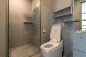 Modern bathroom with a shower and smart toilet