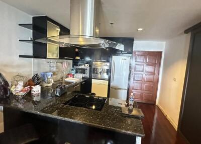 Modern kitchen with stainless steel appliances and countertop