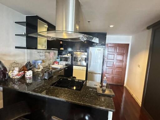 Modern kitchen with stainless steel appliances and countertop