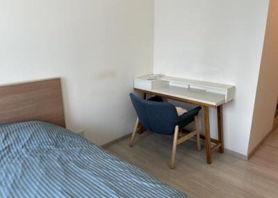 Bedroom with bed and study desk