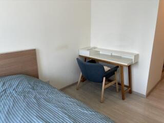 Bedroom with bed and study desk