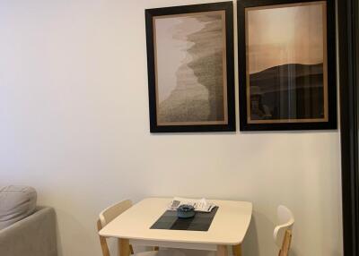 Small dining area with table and chairs