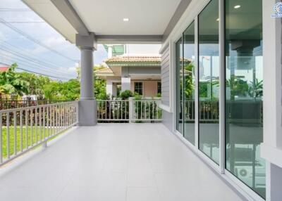 Spacious porch area with garden view