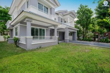 Exterior view of a suburban house with a front yard