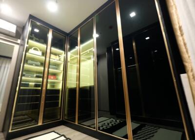 Spacious Walk-in Closet with Glass Doors