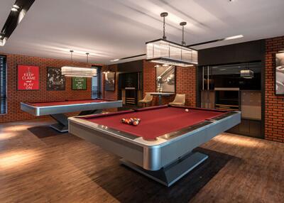 Modern recreational room with pool tables