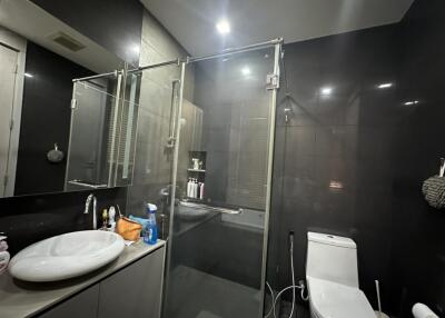 Modern bathroom with glass shower and contemporary fixtures