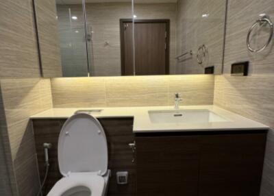 Modern bathroom with large mirror and sink