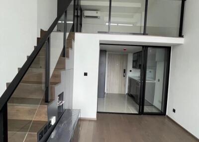 Living space with staircase and mezzanine