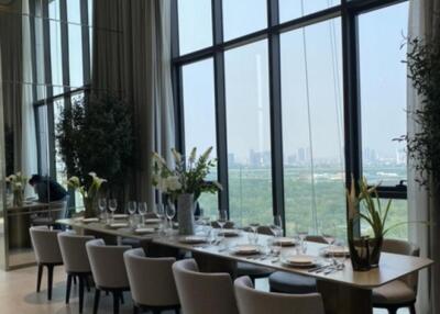 Modern dining room with floor-to-ceiling windows