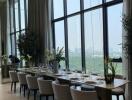 Modern dining room with floor-to-ceiling windows