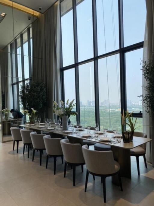 Modern dining room with floor-to-ceiling windows