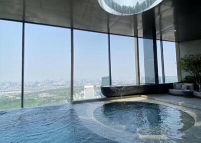 Luxurious indoor pool with city view