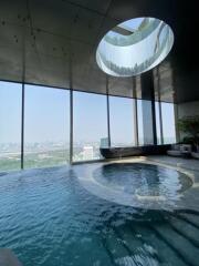 Luxurious indoor pool with city view