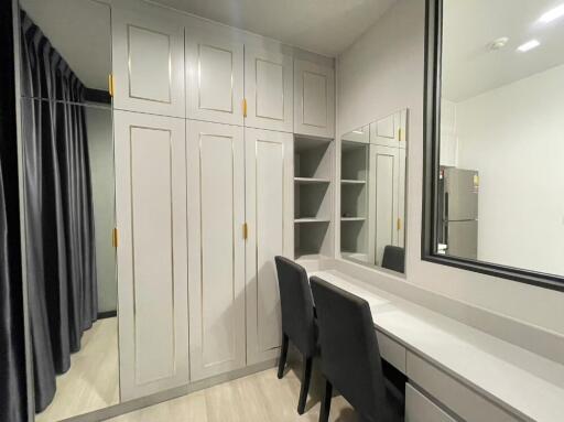 Bedroom with vanity and closet