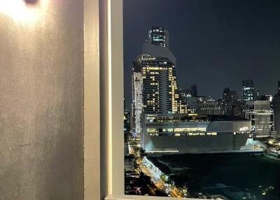 Night view from a balcony with cityscape