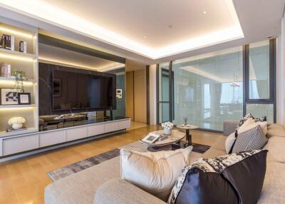 Modern living room with large television and stylish decor