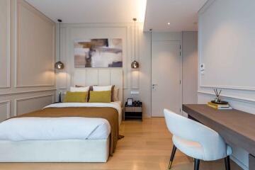 Modern bedroom with a double bed, desk and contemporary decor