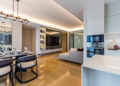 Modern open-plan living area with dining and kitchen