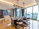 Modern dining room with a view, featuring a long table and large windows.