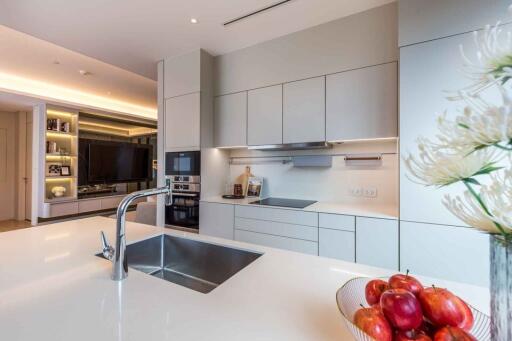 Modern kitchen with integrated appliances and island