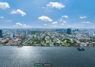 Aerial view of a cityscape with water and buildings