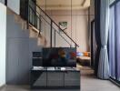 Modern living room with mezzanine and wall-mounted TV