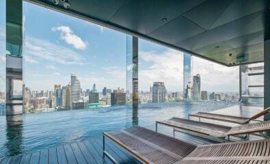 Infinity pool with city skyline view