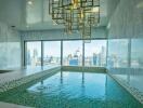 Indoor swimming pool with city view