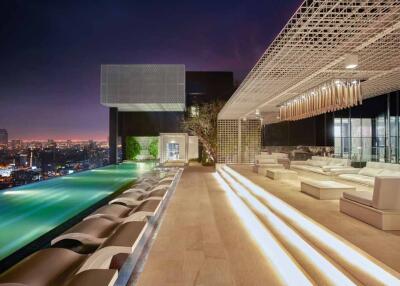 Modern rooftop terrace with pool and city view