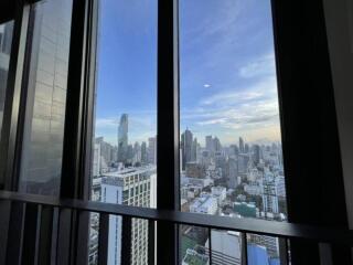 Cityscape view from high-rise building window