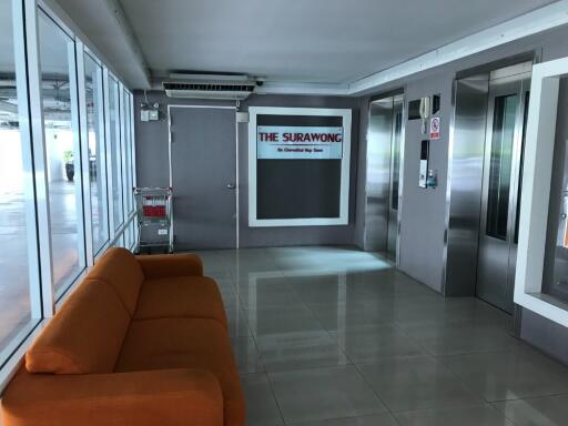 Building lobby area with elevators