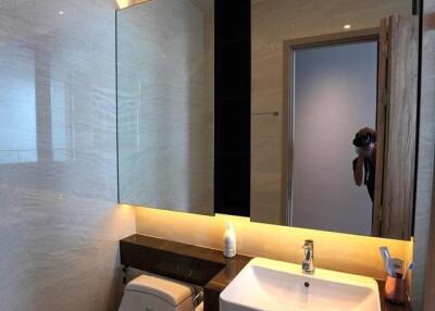 Modern bathroom with large mirror and sink