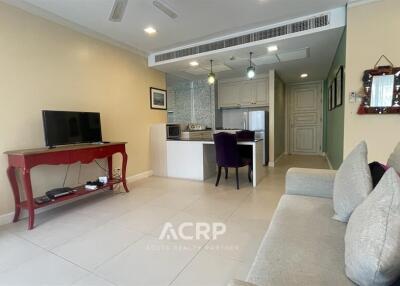 Spacious and modern living room with kitchen view