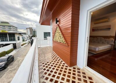 Balcony with view and adjacent bedroom