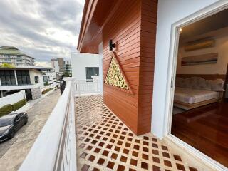 Balcony with view and adjacent bedroom