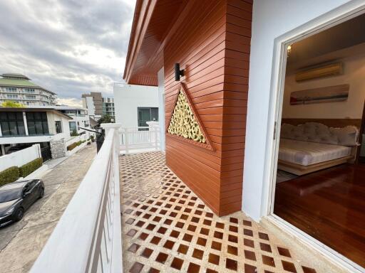 Balcony with view and adjacent bedroom