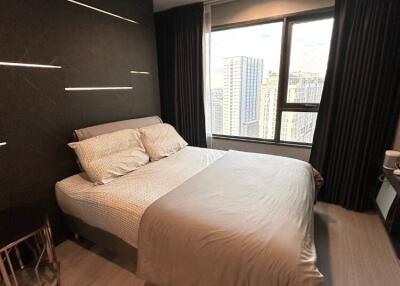 Modern bedroom with a city view