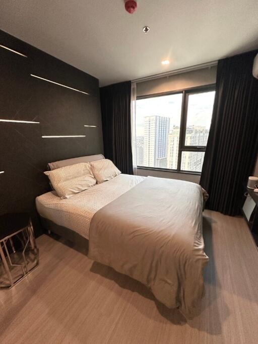 Modern bedroom with a city view