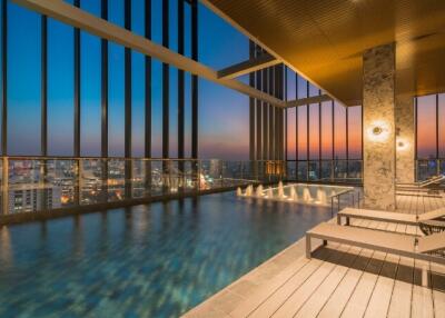 Rooftop infinity pool with city skyline view