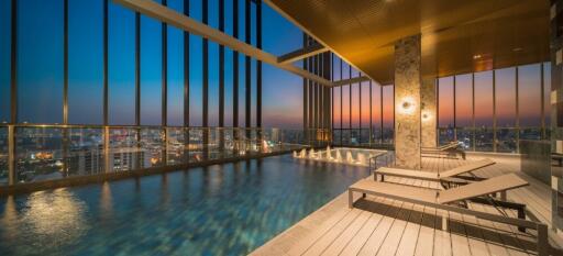 Rooftop infinity pool with city skyline view