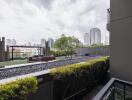 Rooftop garden and seating area with city skyline view