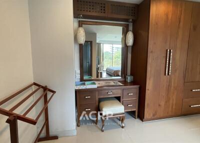 Bedroom with wooden furniture