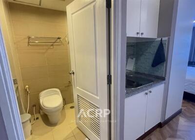 Apartment bathroom and kitchenette view