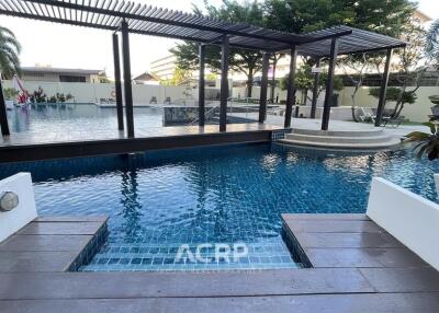 Outdoor swimming pool with spacious deck and modern design