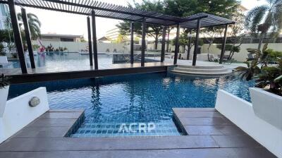 Outdoor swimming pool with spacious deck and modern design