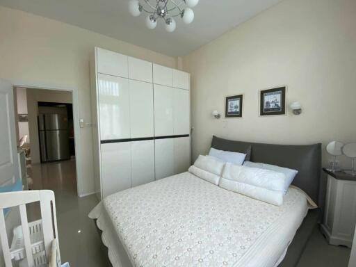 Modern bedroom with wardrobe and bed