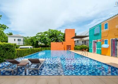 Colorful building with outdoor swimming pool