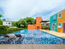 Colorful building with outdoor swimming pool