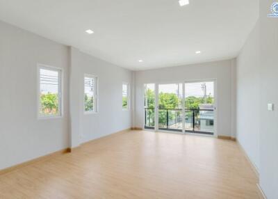 Spacious and bright living room with large windows